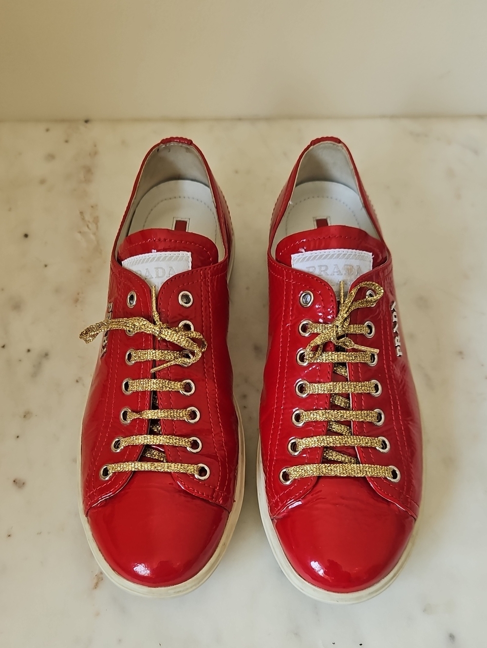 PRADA: Lipstick Red Patent Leather Logo Sneakers